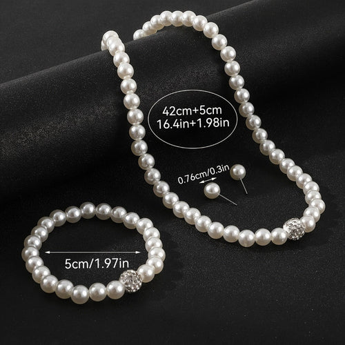 3‑delat smyckeset med imitationpärlor: halsband, armband och örhängen, silverfärg, kristalldetaljer, elegant