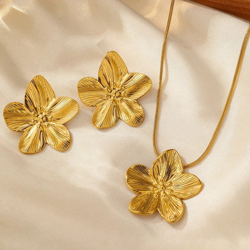 Neo guldfärgat smyckesset i rostfritt stål med halsband och blomörhängen